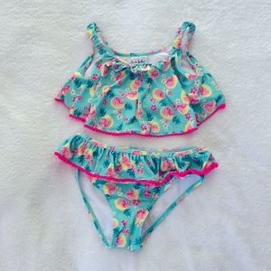 Nicole Miller 2-piece swimsuit.